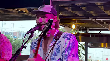 Tophouse performing on tour